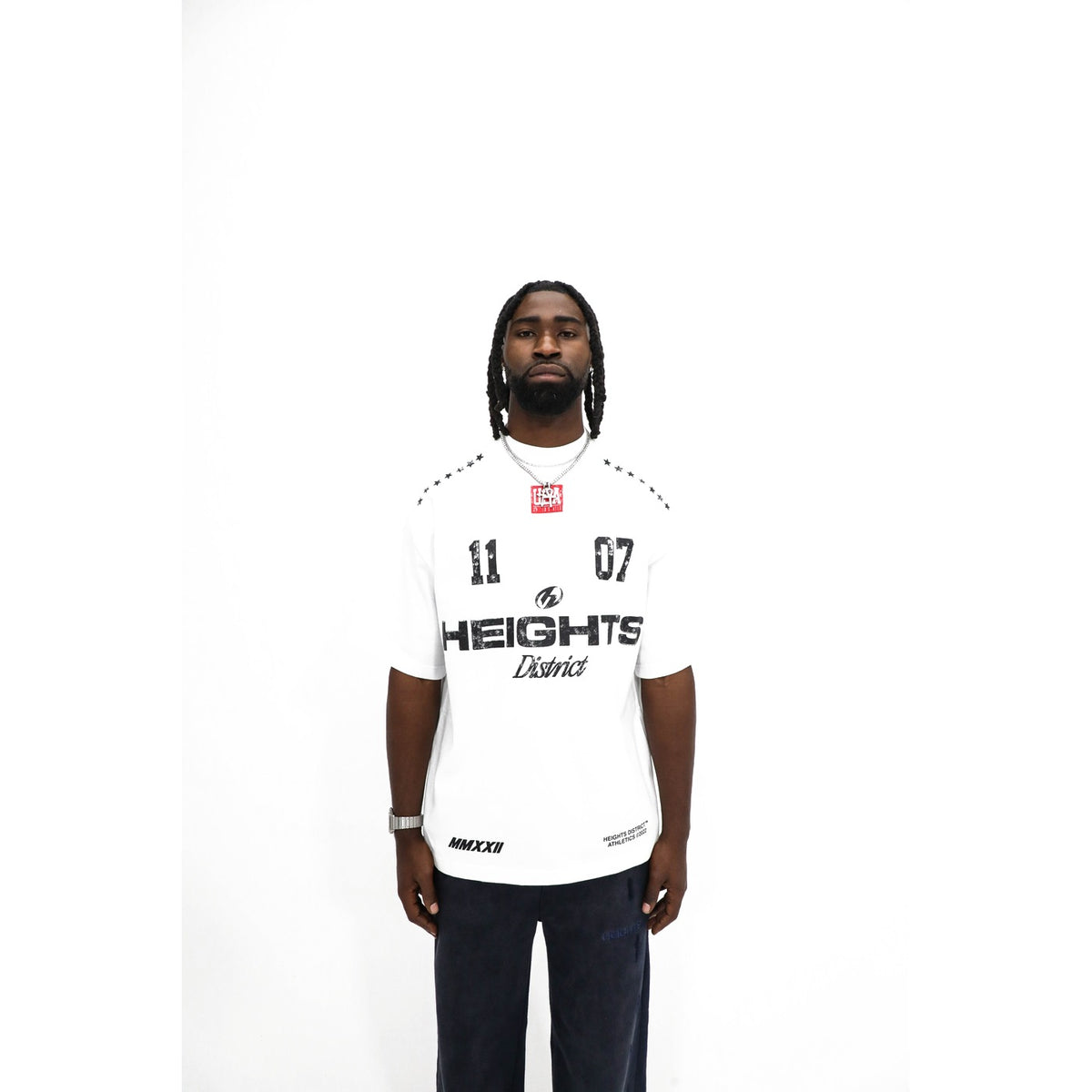 Heights District 11/07 Jersey Tee, front detail — HEIGHTS athletic italic and District script