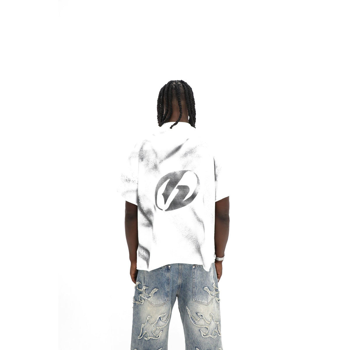 Heights Daily News tee, back — hand-sprayed circle-H stencil with overspray on white