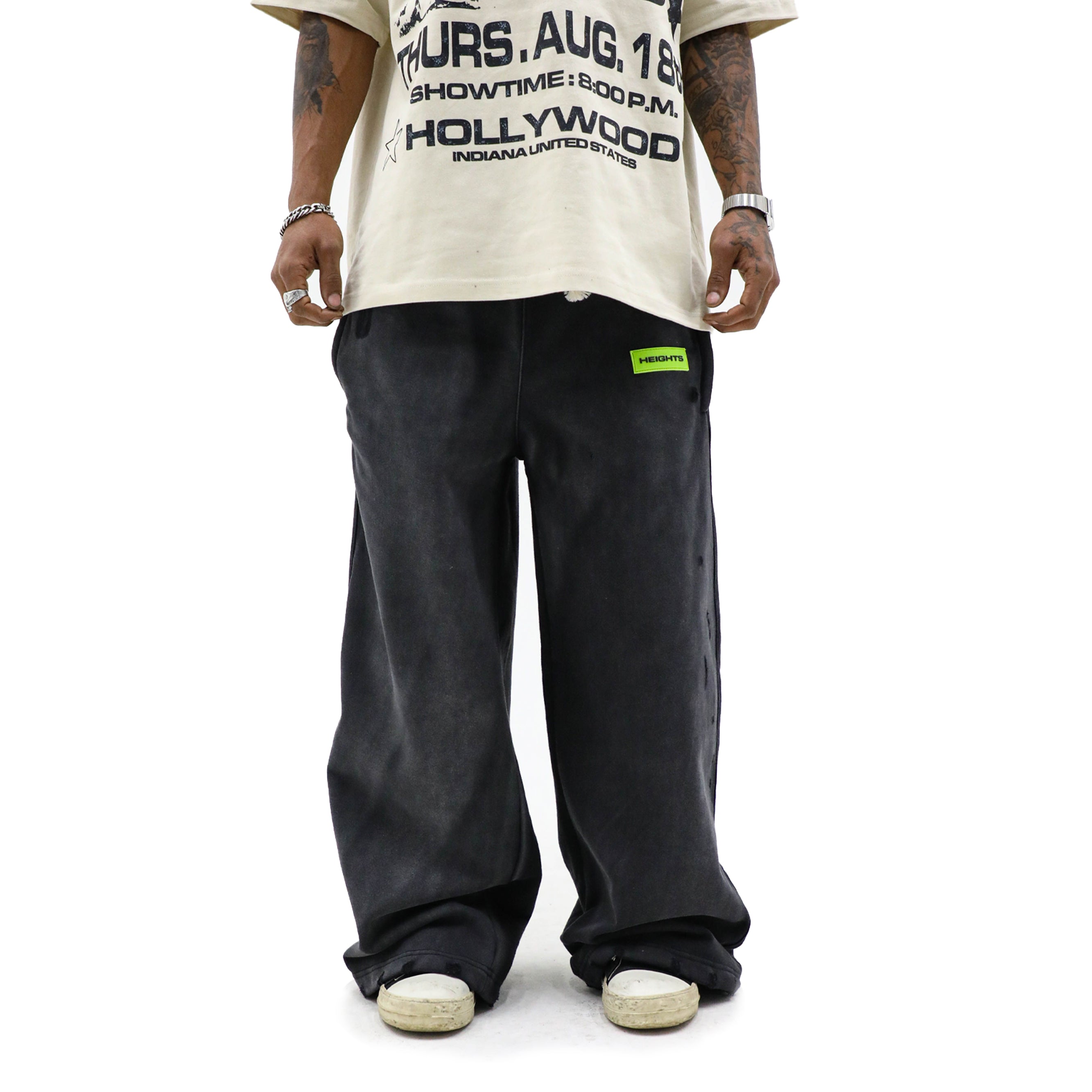 HeightsDistrict Essential Fleece Flares 2.0 pants in cozy fleece fabric with a flared leg design, displayed on a white background.