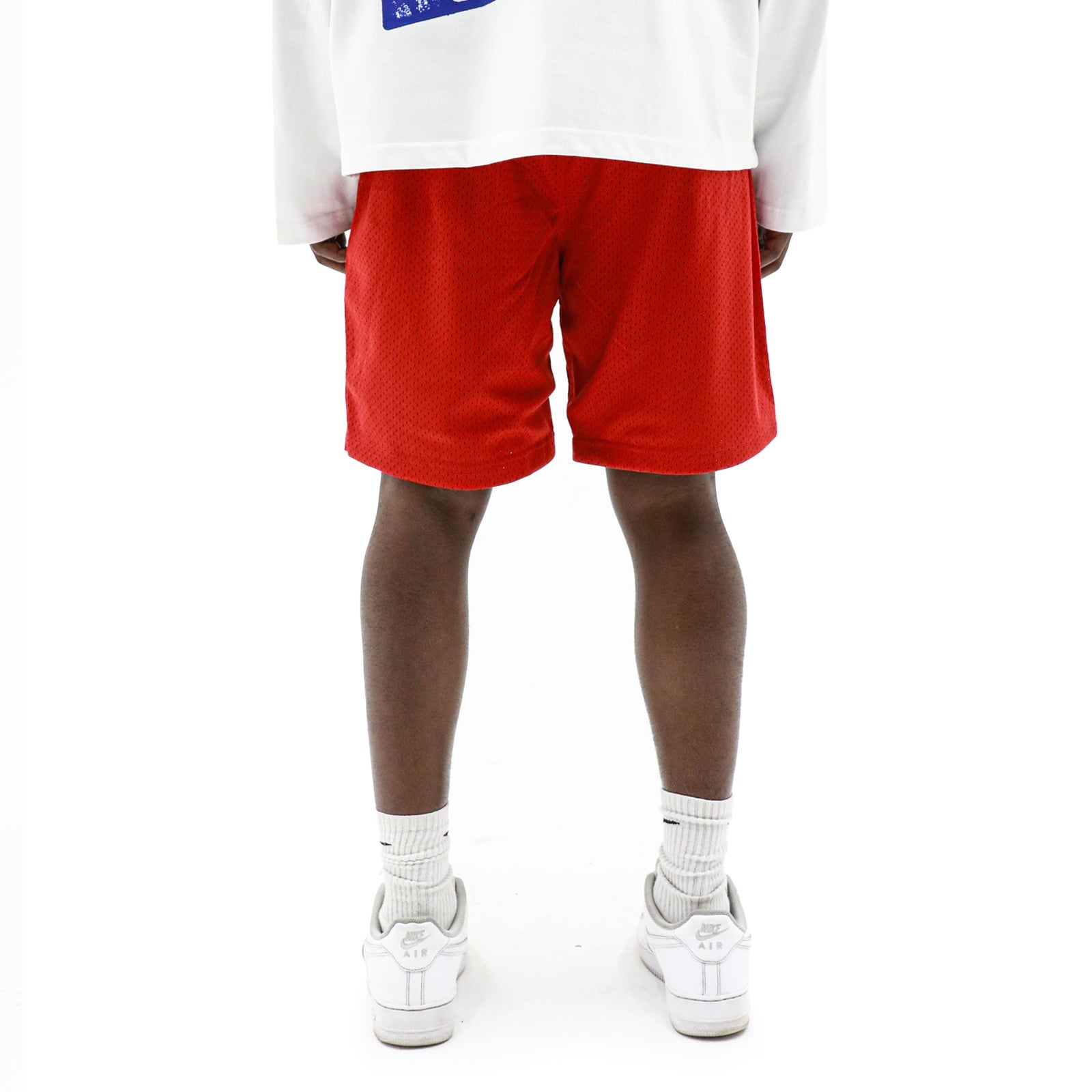 HeightsDistrict Flame Mesh Shorts laid flat, featuring a vibrant flame pattern and athletic fit for casual or active wear.