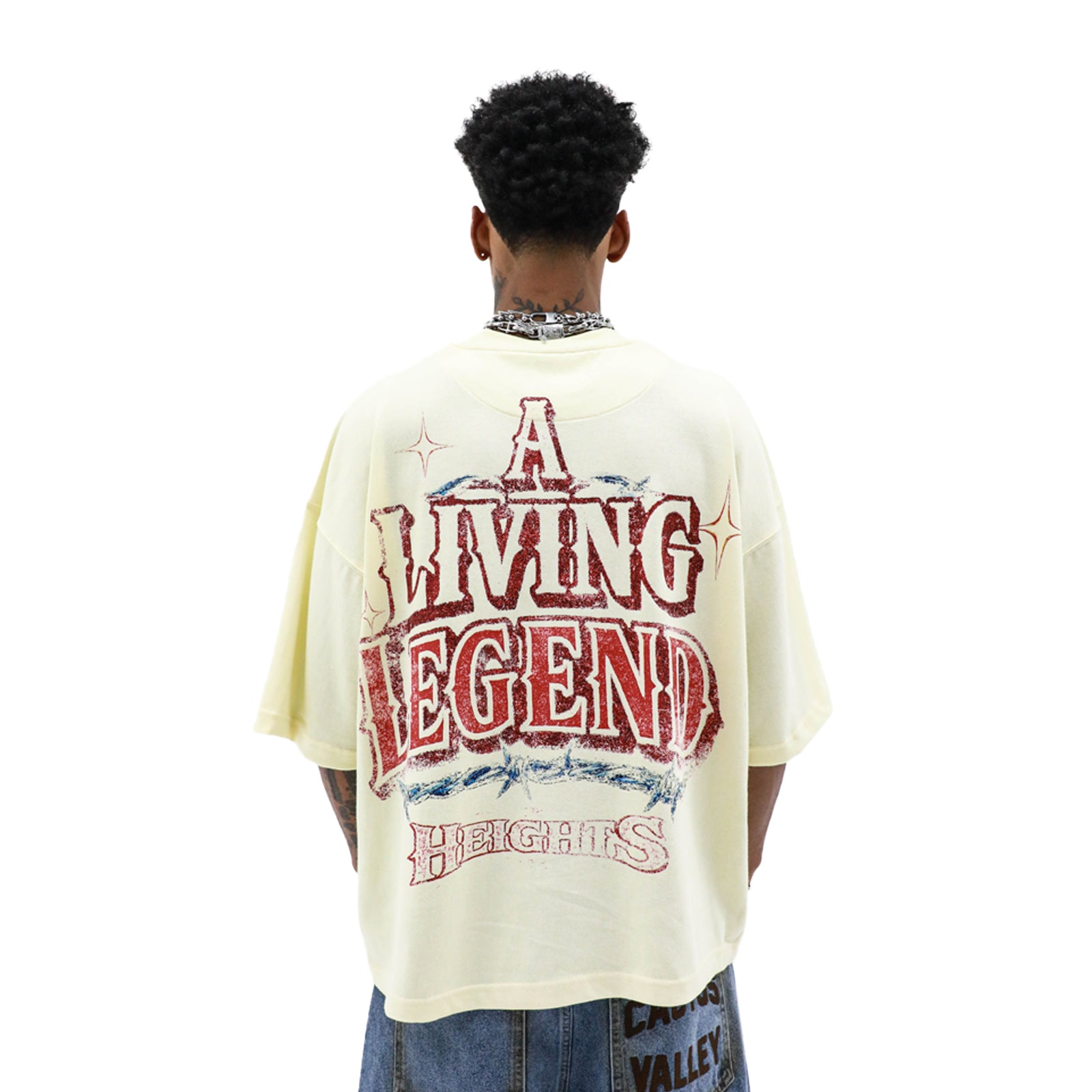 Black "A Living Legend" T-shirt by HeightsDistrict with bold graphic text on front, casual fit, and soft cotton fabric.