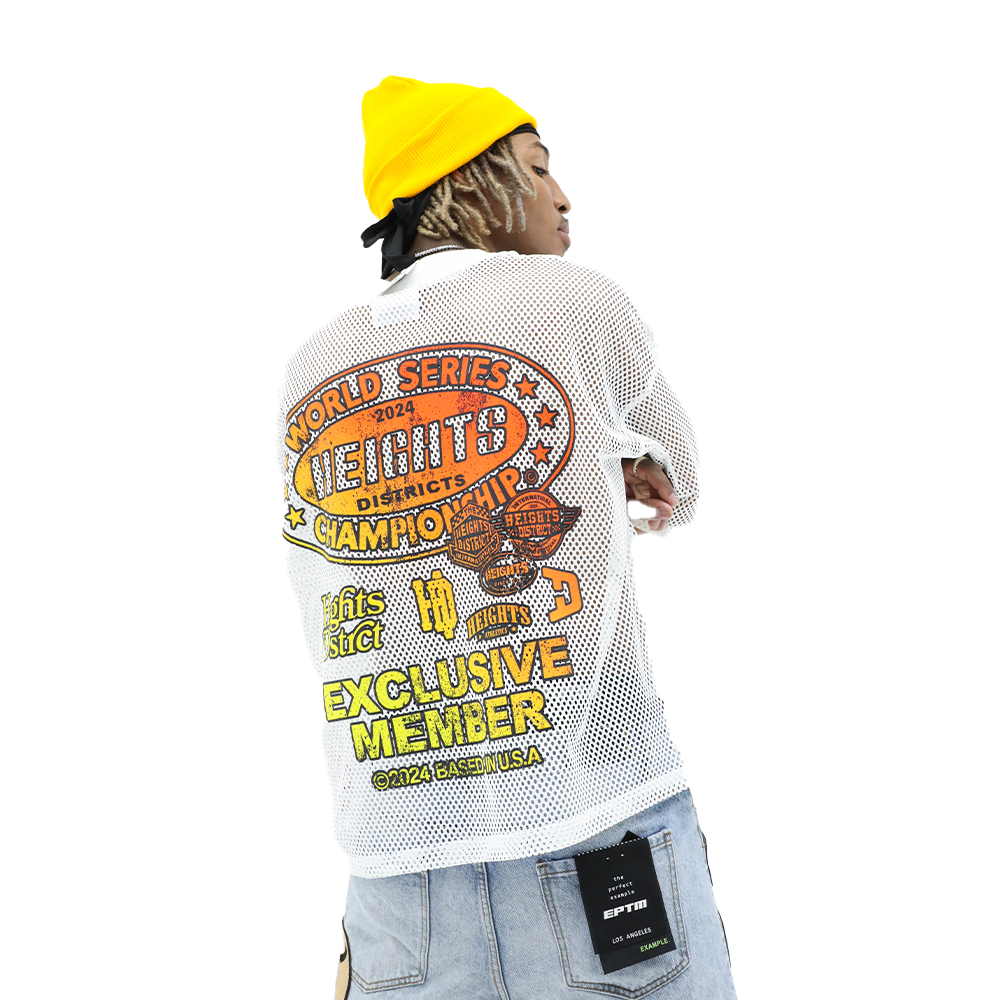 HeightsDistrict Heights Stadium Jersey, a sports tops with team logo and vibrant colors, worn by a model standing outdoors.