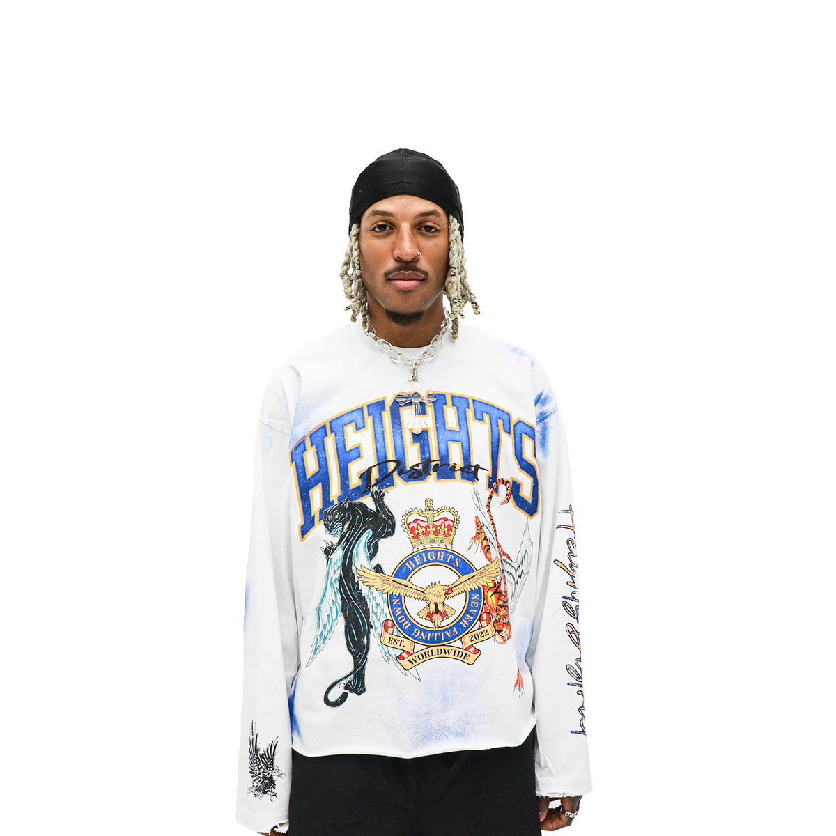 Model standing upright wearing Back To The Source long sleeve front