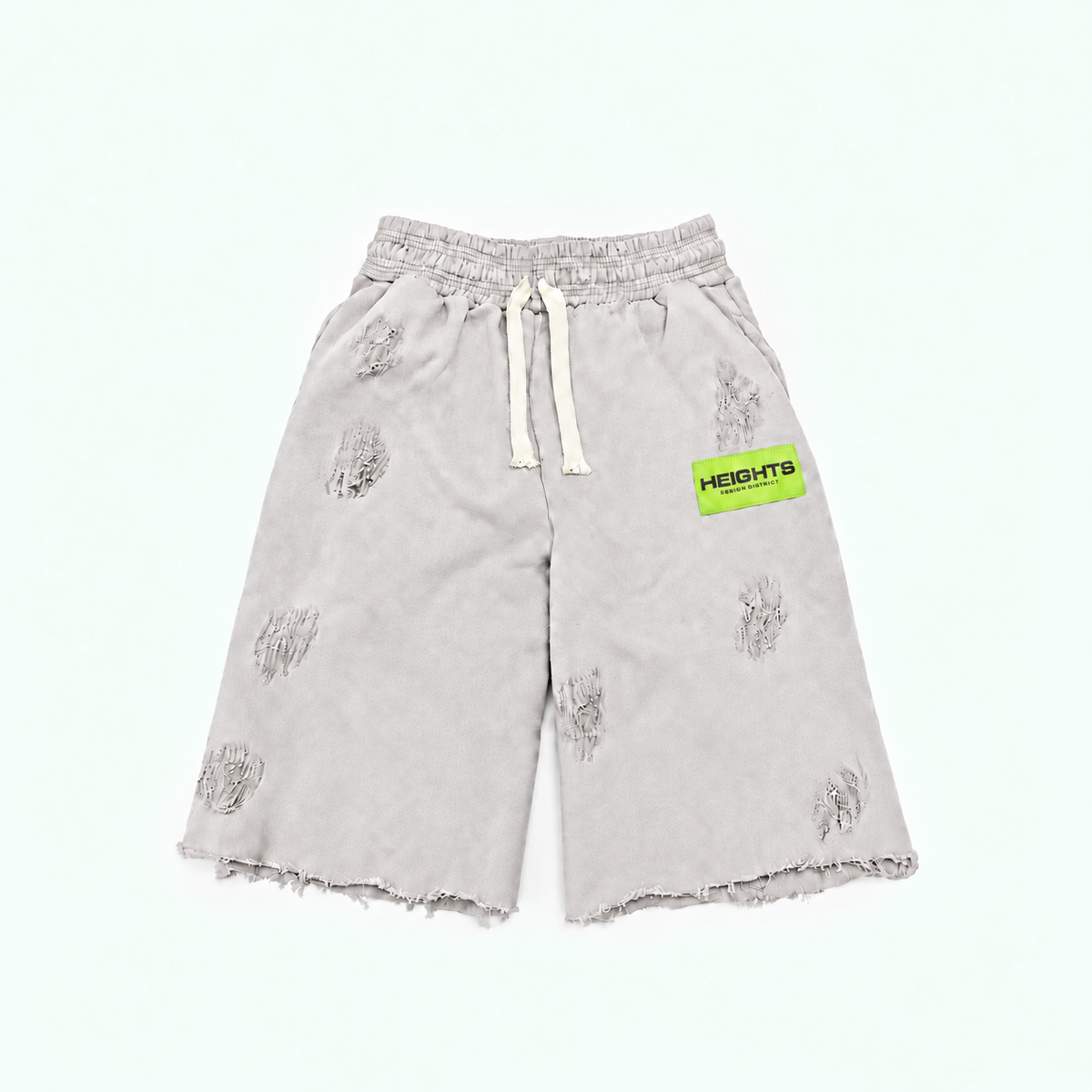 Heights Essential Short flat lay in Vintage Grey — neon green woven label, distressed 450 GSM fleece, raw-cut hem