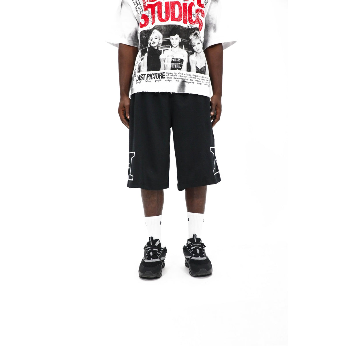 Heights Outline Logo Shorts, styled — black shorts with white outline H on the leg