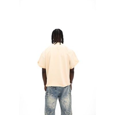 Heights Studios We Love The Birds tee, back — clean sand body with cut sleeves and raw hem