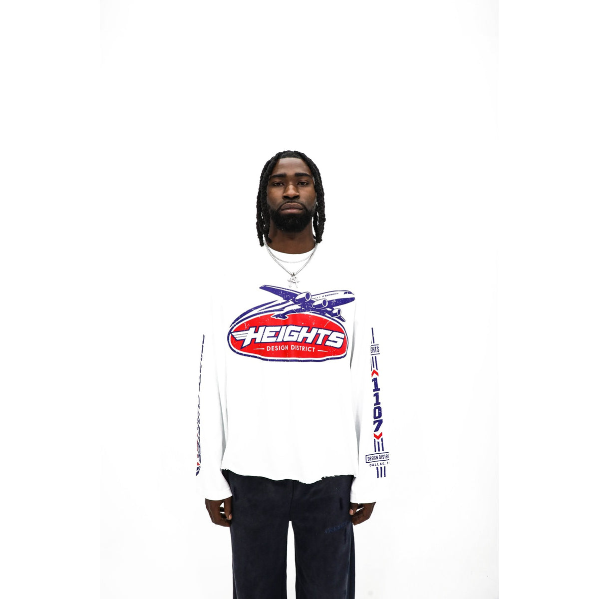 Heights Private Charter long sleeve, front — navy jet over a red HEIGHTS shield on white