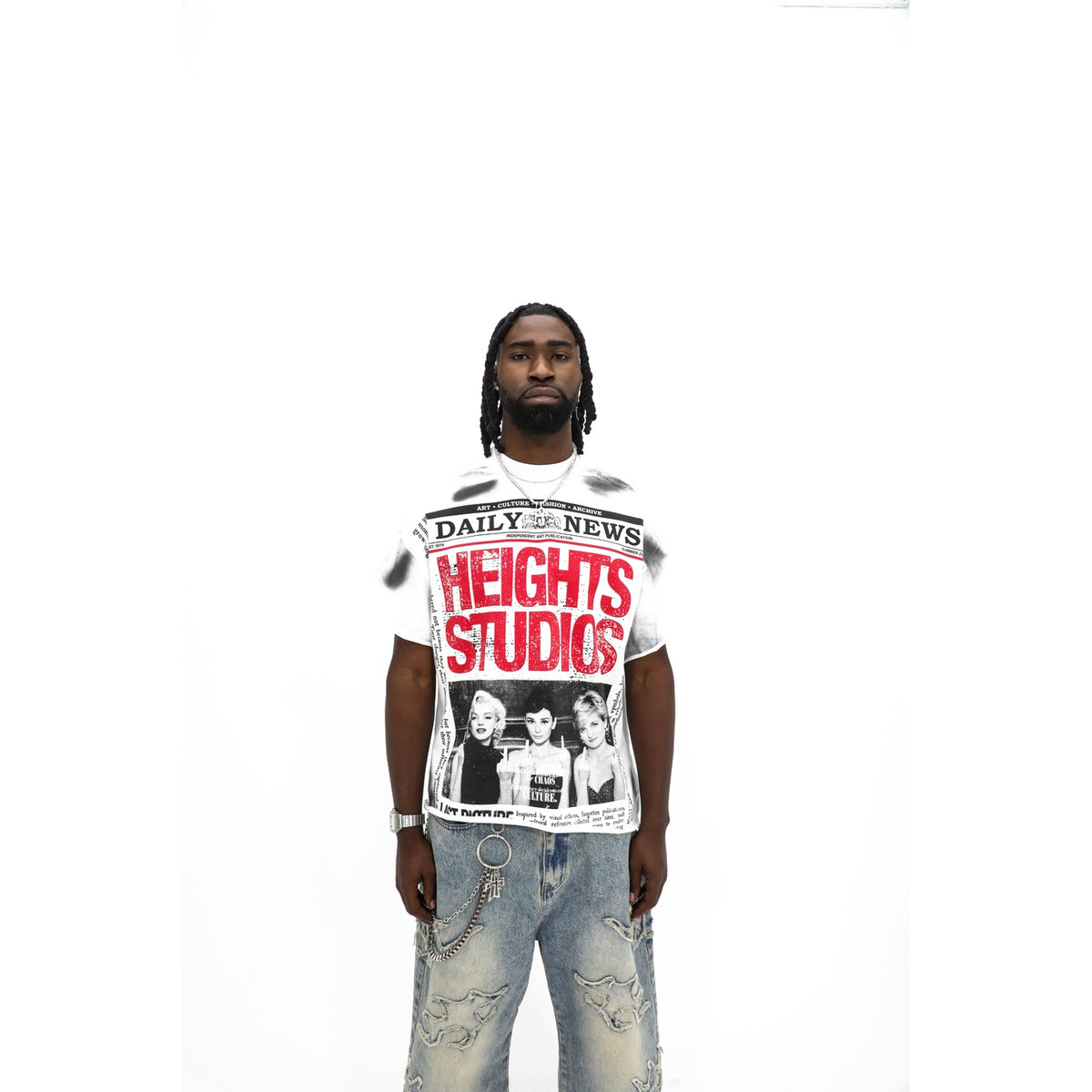 Heights Daily News tee, front detail — portrait collage and newspaper column type