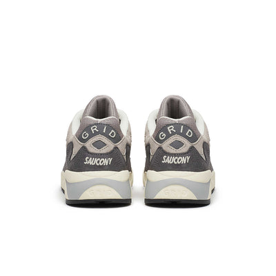 Saucony Grid Shadow 2 running shoes with black and white design, featuring cushioned midsoles and sporty style.