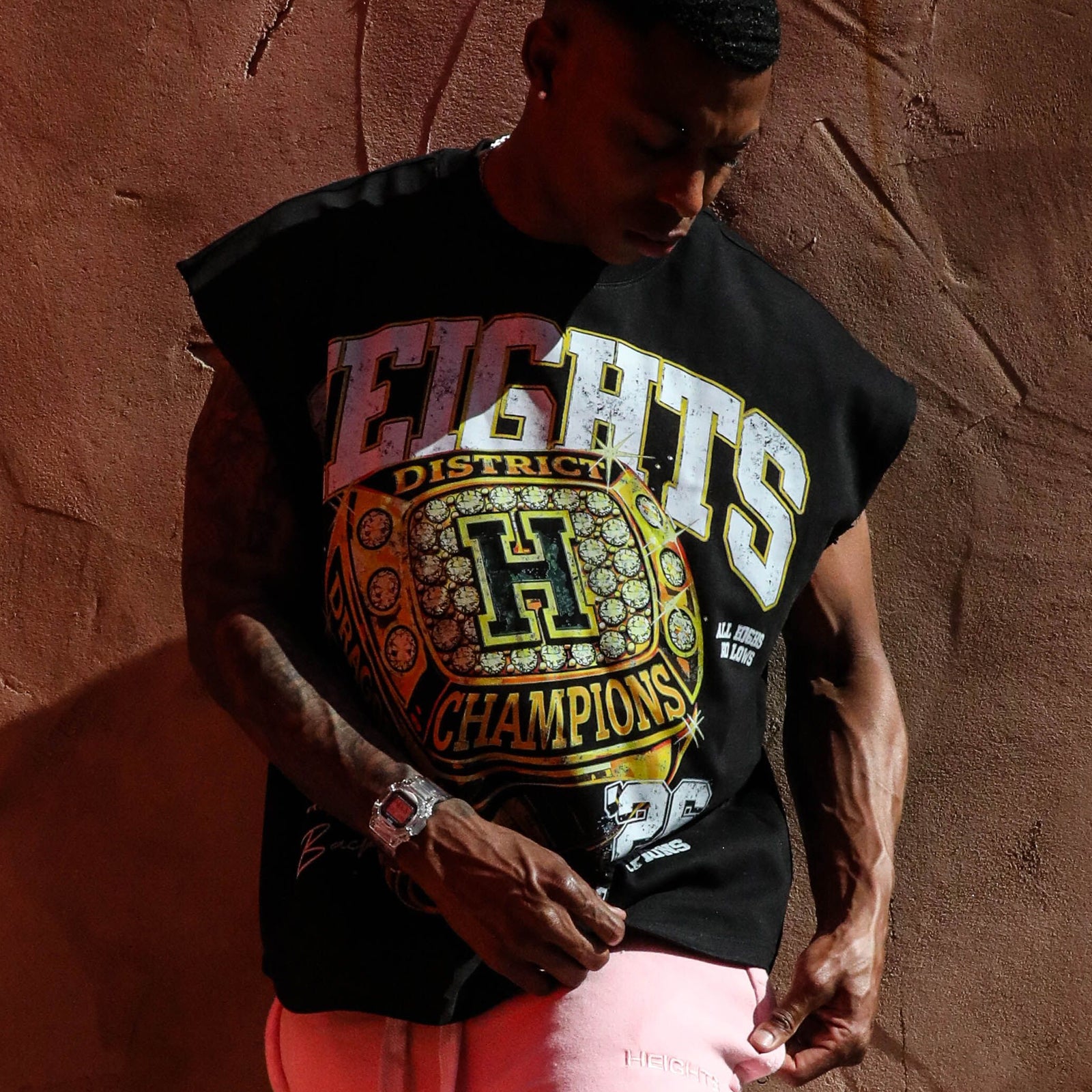 HeightsDistrict Heights Championship '26 T-shirt showing bold graphic design and vibrant colors on a casual fit shirt.