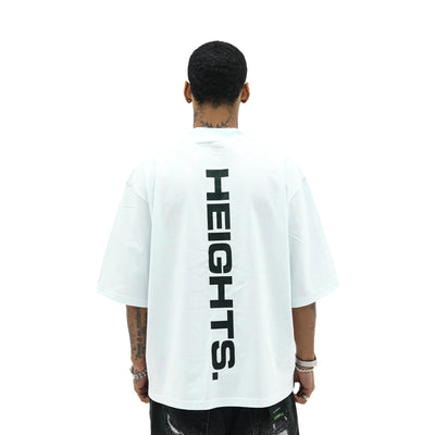 HeightsDistrict Loyalty Ain't Dead T-shirt featuring bold printed slogan on black cotton fabric.