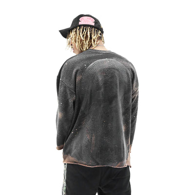 HeightsDistrict Saint Mary acid wash denim jeans displayed on a hanger with a faded, vintage look and distressed details.