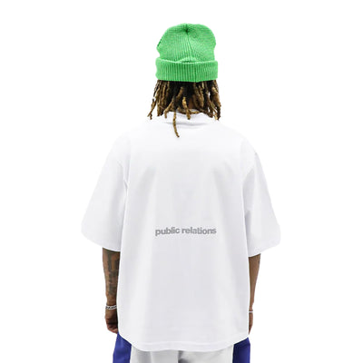 Black "Free Her" T-shirt by HeightsDistrict, featuring bold white text on soft cotton fabric.