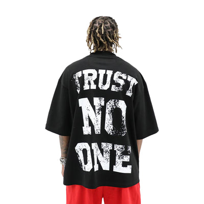 Trust No One hoodie by HeightsDistrict, front view showing black fabric and bold white "Trust No One" text on the chest.