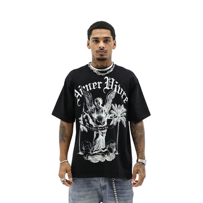 Aimer Vivre Angel & Palms T-Shirt featuring a printed angel and palm tree design on soft fabric, displayed on a hanger.