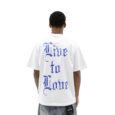 Aimer Vivre Angel & Palms T-Shirt featuring a stylish design with angel wings and palm leaves on soft fabric.