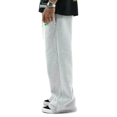 HeightsDistrict Essential Fleece Flares pants in cozy fleece fabric, featuring a fitted waist and flared leg design.
