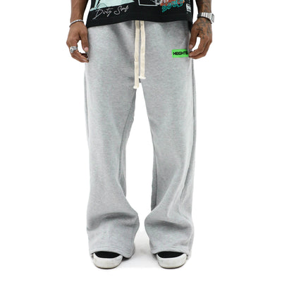 Beige Essential Fleece Flares pants by HeightsDistrict with a high-waisted fit and flared leg silhouette.