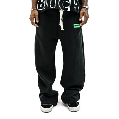 HeightsDistrict Essential Fleece Flares pants in cozy fleece fabric, featuring a high-waisted, flared leg design for casual style.