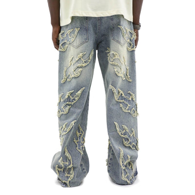 HeightsDistrict Inferno distressed denim jeans showing faded, ripped details and classic denim texture on a clean background.