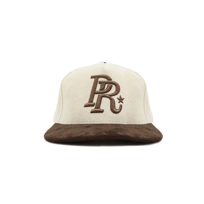 HeightsDistrict PR suede varsity snapback headwear with a structured brim and adjustable strap in a sleek suede finish.