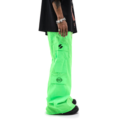 Neon parachute cargo pants by HeightsDistrict featuring bright neon fabric, relaxed fit, and cargo pockets for a bold streetwear look.