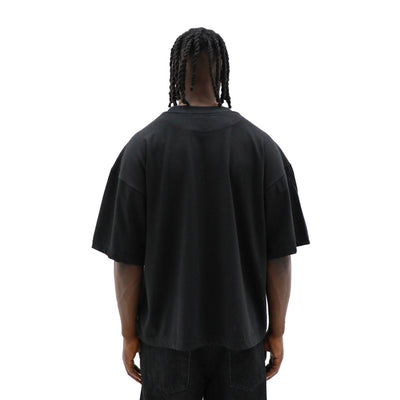 Black "I Need To Be Alone" T-shirt by HeightsDistrict displayed flat, showing the front design on a plain background.