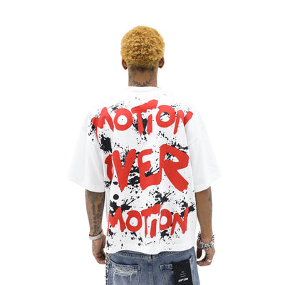 Black Motion Over Emotion T-shirt by HeightsDistrict featuring bold white text design on front.
