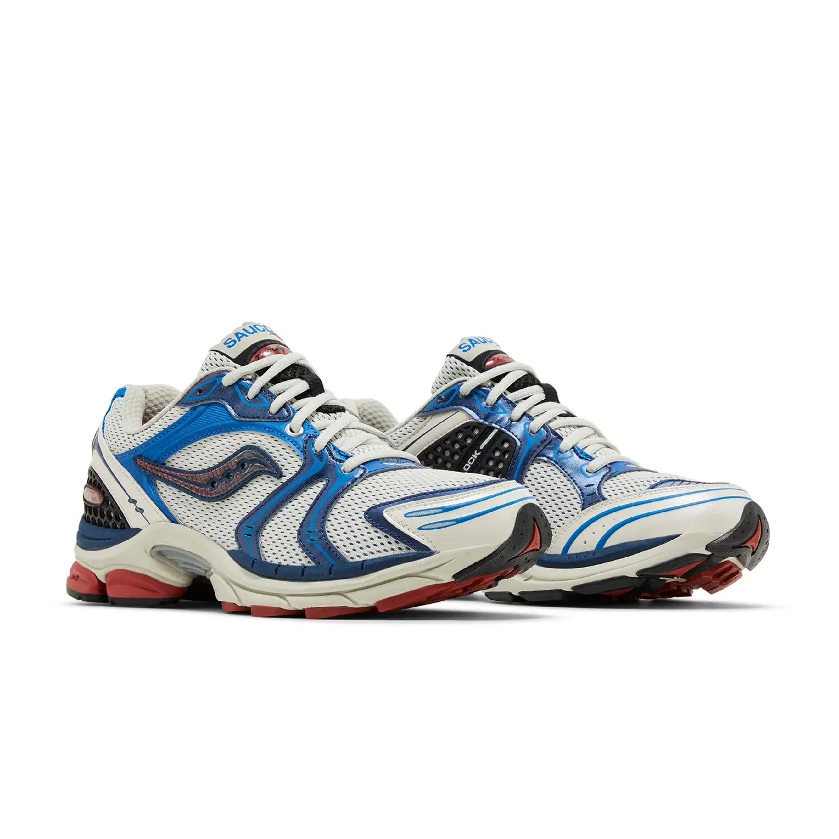 Saucony ProGrid Triumph 4 shoes in blue and rust, featuring a sleek design and cushioned sole for comfort.