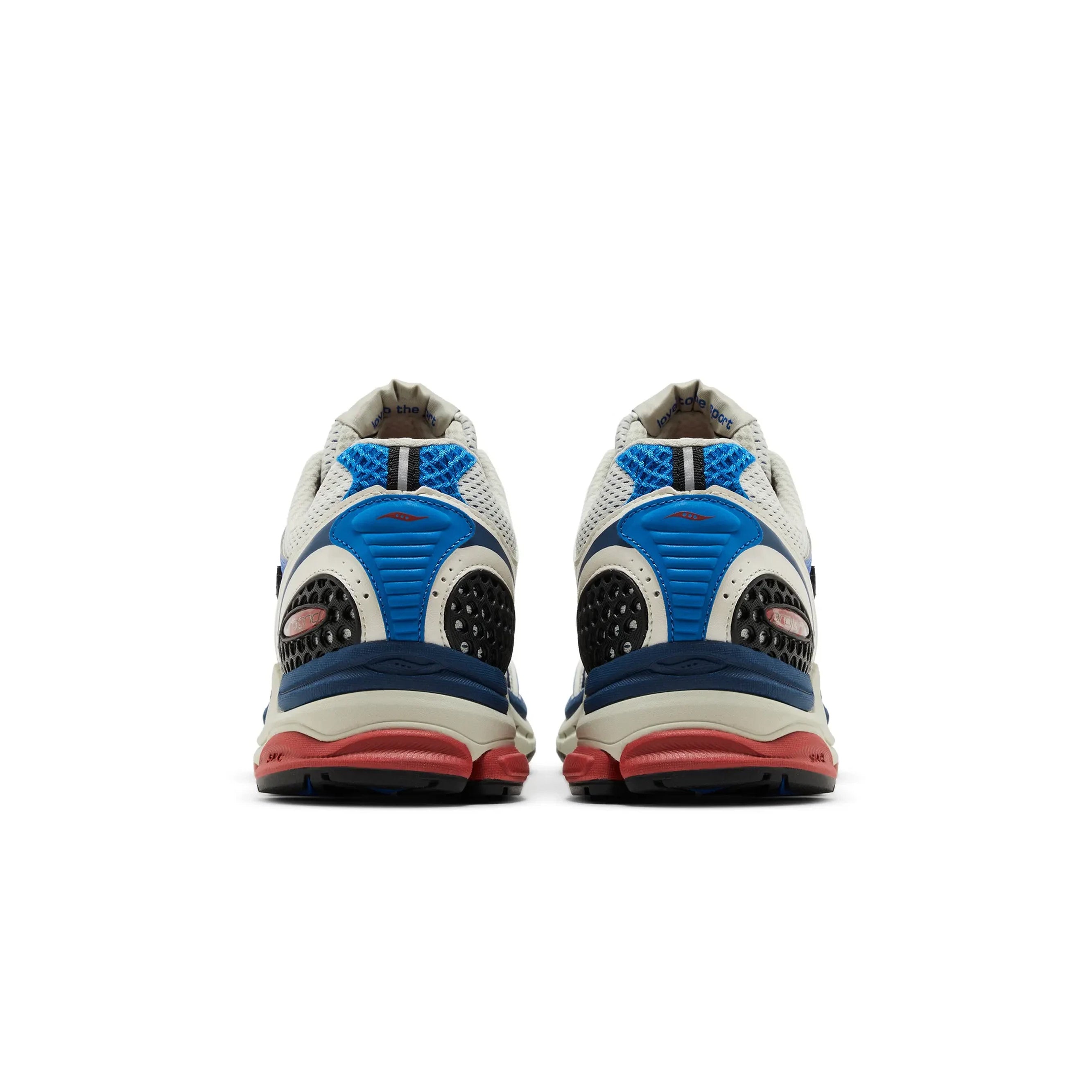 Saucony ProGrid Triumph 4 shoes in blue and rust, showcasing the sleek design and cushioning features.