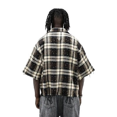 Brown rhinestone flannel top by HeightsDistrict with sparkling embellishments, casual style, and soft fabric.