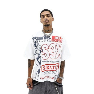 HeightsDistrict Paris Adult Store T-shirt with graphic print, white cotton fabric and casual fit, displayed on a hanger.