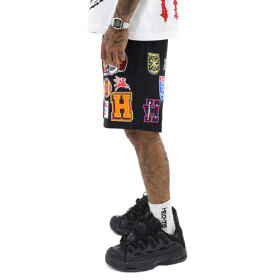 Vintage Patch Varsity Shorts by HeightsDistrict featuring colorful embroidered patches and a classic athletic style.