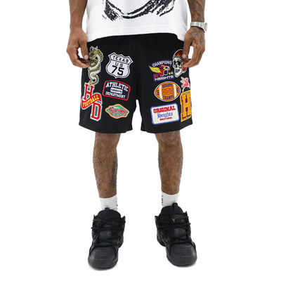 Vintage patch varsity shorts by HeightsDistrict, featuring classic design with colorful patch accents and a relaxed fit.