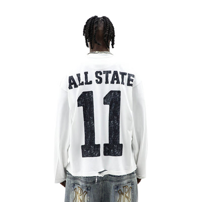 HeightsDistrict G.O.A.T. T-shirt featuring a stylish graphic design on a black cotton shirt.