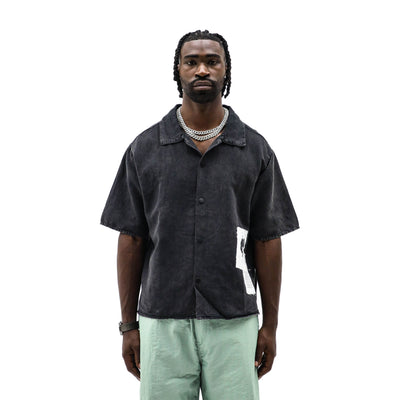 Black Island collared shirt for men, featuring a classic design with a button-up front and long sleeves.