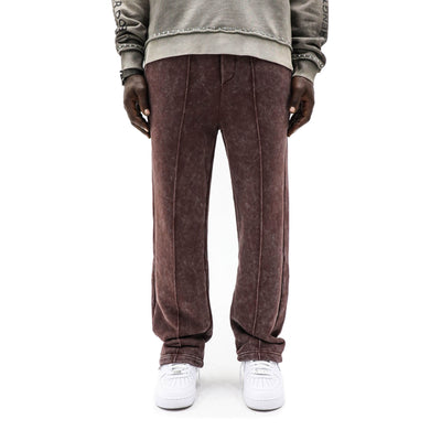 Black Island creased jogger top in black, shown with a relaxed fit and detailed fabric texture.