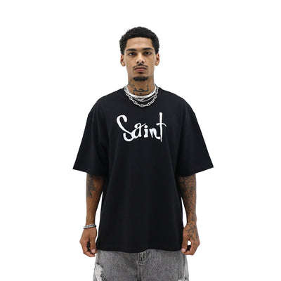 Saint Heights Hustle With Heart T-shirt featuring a bold graphic design in black and white on soft, comfortable fabric.