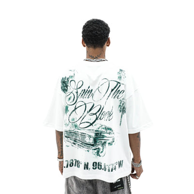 HeightsDistrict Spin The Block T-shirt featuring bold graphic design on a comfortable black cotton shirt.
