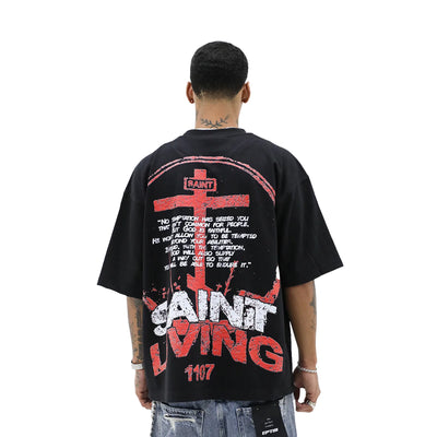 Black Saint Living T-shirt by HeightsDistrict with logo design, casual fit, and soft fabric, displayed on a neutral background.