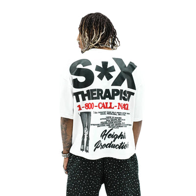Black T-shirt from HeightsDistrict featuring "The Sex Therapist" graphic print on the front.