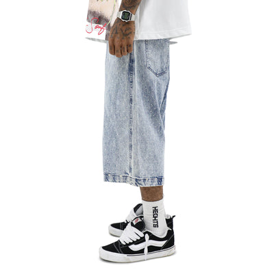 Rhinestone denim shorts by HeightsDistrict featuring embellished details and a casual fit, styled on a mannequin.