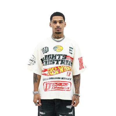 HeightsDistrict Fast Wheels T-shirt featuring a graphic design, black fabric with colorful wheel illustration on the front.