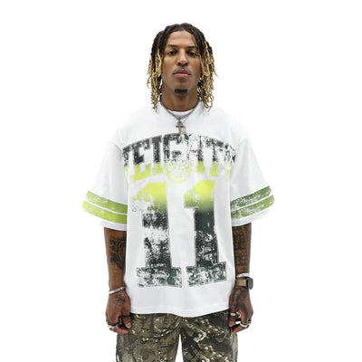 HeightsDistrict Varsity Eleven T-shirt with bold varsity lettering and team logo on front, white cotton fabric.