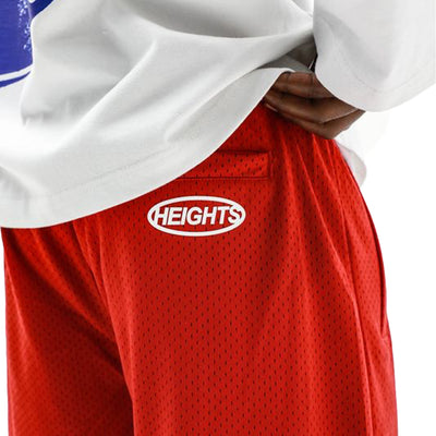 HeightsDistrict Flame Mesh Shorts shown with lightweight, breathable orange and black flame design fabric, casual athletic shorts.