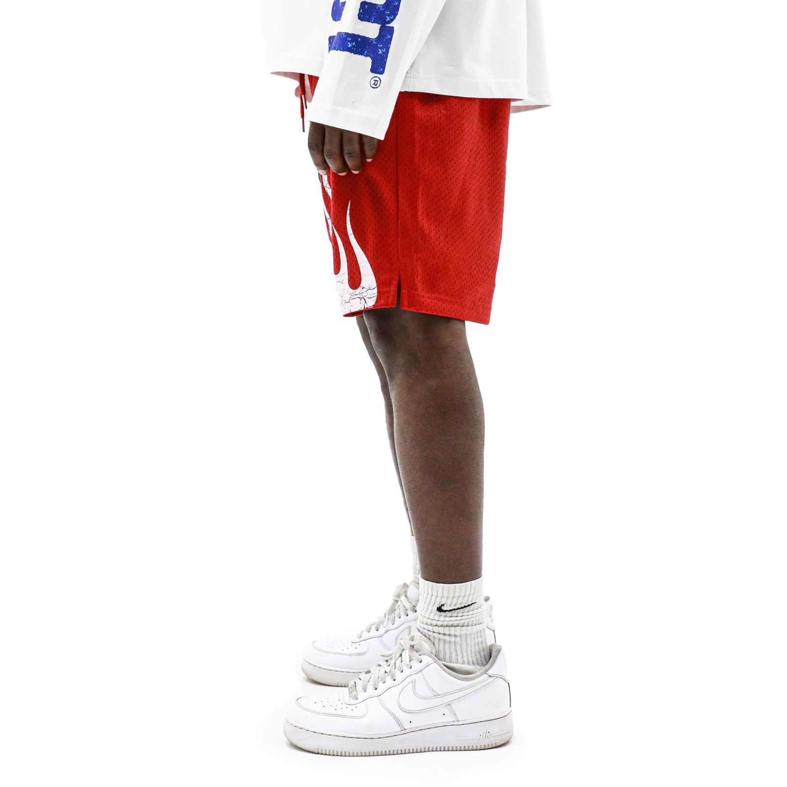 HeightsDistrict Flame Mesh Shorts shown in black with orange flame design, lightweight athletic shorts for active wear.