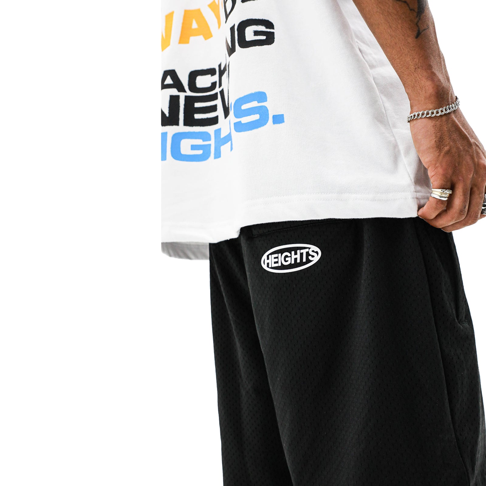 HeightsDistrict Heights HD uncut mesh shorts, black athletic shorts with breathable mesh fabric and elastic waistband.