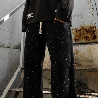 Rhinestone flares from HeightsDistrict featuring sparkling embellishments and a fitted high-waist design for stylish appeal.