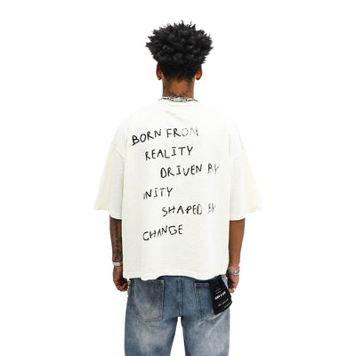 Born From Peace Tee - Cream worn on model, back view, on a white background