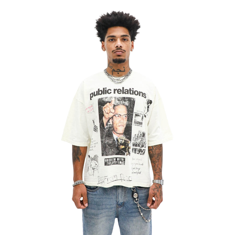 Born From Peace Tee - Cream worn on model, front view, on a white background